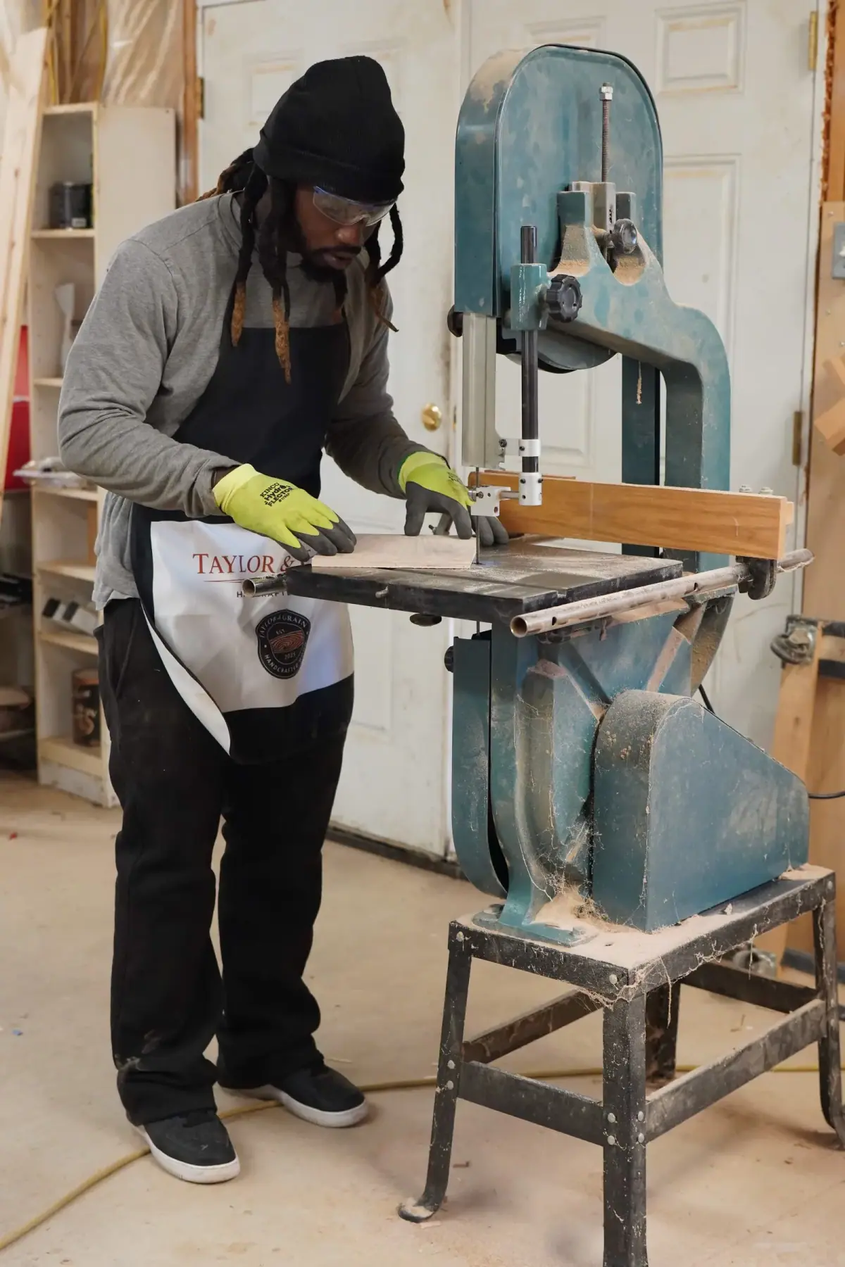 Dan cutting a stool template on the band saw at Taylor & Grain